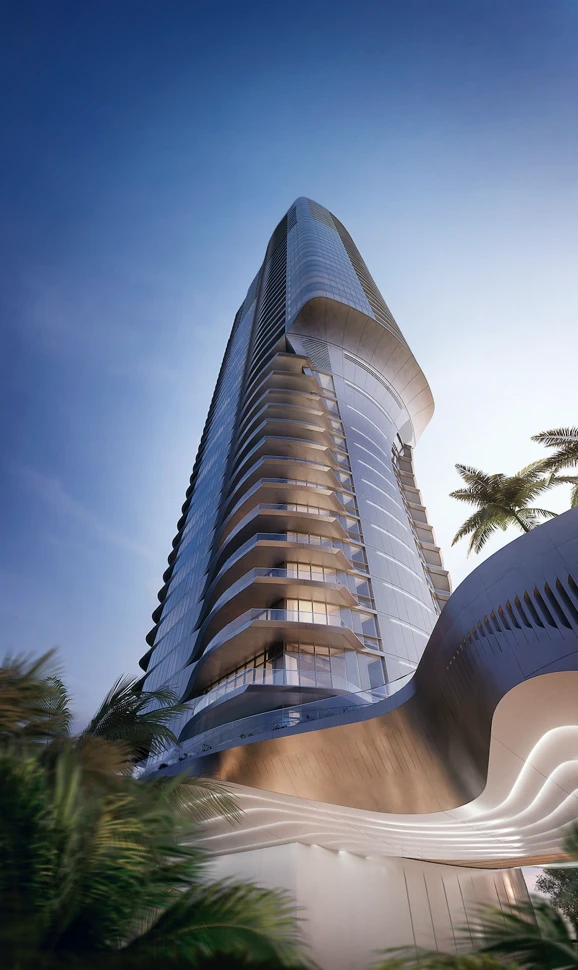 Rendering of Una Residences, a curving glass tower with sculpted balconies, seen from below at dusk